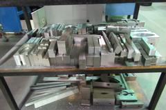 Work Table with 40 Taper Tool Vise and Contents including Large Assortment of Aluminum Vise Jaws