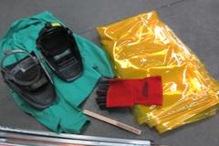 Welding Equipment: (2) Darkening Welding Helmet, (2)Curtains , 2XL Welding Jacket, Welding Wire, Brush