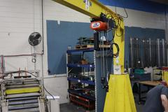 Handling Systems 2 Ton Swiveling Jib Crane, Floor Mounted with CM Lodestar 2 Ton Electric Chain Hoist, Electric Trolley