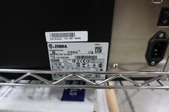 (2) Zebra 110Xi4 Label Printers, 203 dpi, 4" Wide Label Cap - On Wire Cart with Labels