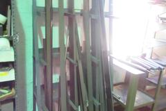 Material Storage Rack and Content, Mostly Flat Bar Stock