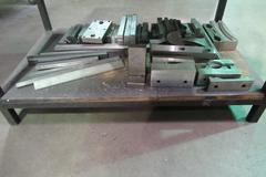 Work Table with 40 Taper Tool Vise and Contents including Large Assortment of Aluminum Vise Jaws