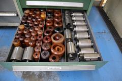 114 Style Turret Punch Tooling in Stanley Vidmar 9 Drawer cabinet