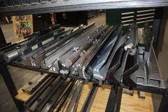 Amada Press Brake Dies, Ram Clamps and Lower Die Holders on Steel Rack