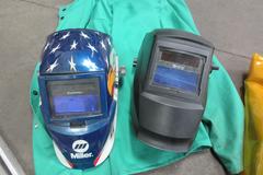 Welding Equipment: (2) Darkening Welding Helmet, (2)Curtains , 2XL Welding Jacket, Welding Wire, Brush