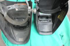Welding Equipment: (2) Darkening Welding Helmet, (2)Curtains , 2XL Welding Jacket, Welding Wire, Brush
