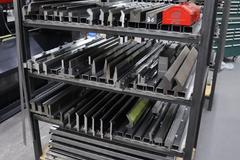 Amada Press Brake Dies, and Lower Die Holders on Welded Steel Shelving
