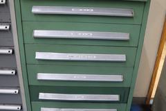 114 Style Turret Punch Tooling in Stanley Vidmar 9 Drawer cabinet