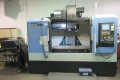 Doosan Mynx 6500/40 CNC Vertical Machining Center with Doosan-Fanuc i Series CNC Control,  30-ATC Thru Spindle Coolant, 12,000 RPM, CAT 40,
