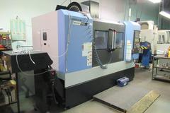 Doosan Mynx 6500/40 CNC Vertical Machining Center with Doosan-Fanuc i Series CNC Control,  30-ATC Thru Spindle Coolant, 12,000 RPM, CAT 40,