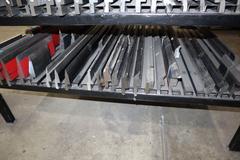Press Brake Dies and Lower Die Holders for Amada Press Brakes on Welded Steel Shelving