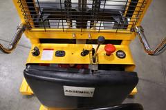 Uline H-5439 Electric Straddle Stacker Lift, 2,200# Cap, 63" Max Height, 50" Between Outriggers, 12 Volt Battery with Charger, 42" Forks