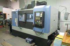 Doosan Mynx 6500/40 CNC Vertical Machining Center with Doosan-Fanuc i Series CNC Control,  30-ATC Thru Spindle Coolant, 12,000 RPM, CAT 40,