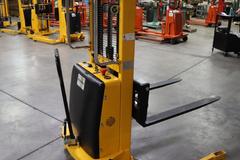 Uline H-5439 Electric Straddle Stacker Lift, 2,200# Cap, 63" Max Height, 50" Between Outriggers, 12 Volt Battery with Charger, 42" Forks