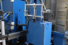 Parker Ionics GX7000M Automated Powder Coating Booth with 24" Wide x 48" High Windows and Top Chain Slot