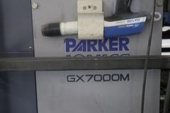 Parker Ionics GX7000M Automated Powder Coating Booth with 24" Wide x 48" High Windows and Top Chain Slot