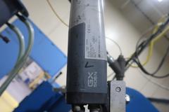 Parker Ionics GX7000M Automated Powder Coating Booth with 24" Wide x 48" High Windows and Top Chain Slot