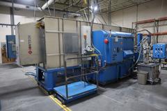 Parker Ionics GX7000M Automated Powder Coating Booth with 24" Wide x 48" High Windows and Top Chain Slot
