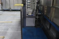 Parker Ionics GX7000M Automated Powder Coating Booth with 24" Wide x 48" High Windows and Top Chain Slot