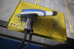 Parker Ionics GX7000M Automated Powder Coating Booth with 24" Wide x 48" High Windows and Top Chain Slot