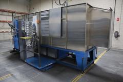 Parker Ionics GX7000M Automated Powder Coating Booth with 24" Wide x 48" High Windows and Top Chain Slot