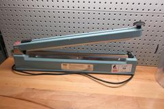 Uline H-1250 Bag Sealer 20", with 6" and 16" Plastic Bag Rolls