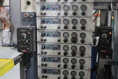 Parker Ionics GX7000M Automated Powder Coating Booth with 24" Wide x 48" High Windows and Top Chain Slot