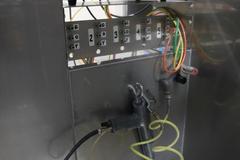 Iontech Powder Coating System with Stainless Steel Booth, Mounted on Track with Wheels