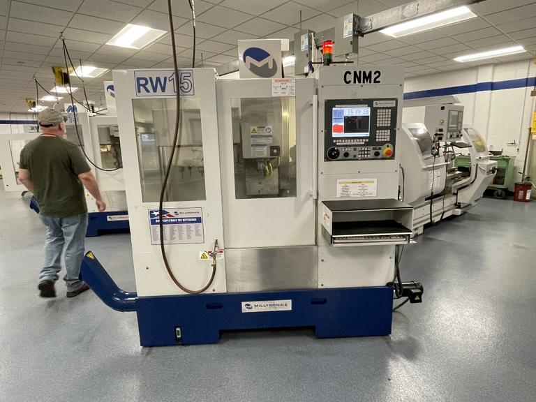 Milltronics RW-15 CNC Vertical Machining Center, 25" x 15" x 20.5". Series D, Milltronics 8200 Control, 16 ATC, 8K RPM, Probing, Chip Auger