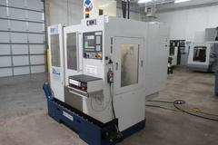 Milltronics RW-15 CNC Vertical Machining Center,  25" x 15" x 20.5". Series D, Milltronics 8200 Control, 16 ATC, 8K RPM, Chip Auger