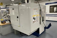 Milltronics RW-15 CNC Vertical Machining Center,  25" x 15" x 20.5". Series D, Milltronics 8200 Control, 16 ATC, 8K RPM, Probing, Chip Auger