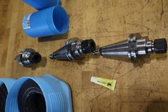 Techniks CT40 Taper Tool Holders: (3) Shell Mill Drivers, (2) ER-20 Collet Holders, (1) ER-16 Collet Holder with (3) 3" (6) Insert Face Mills