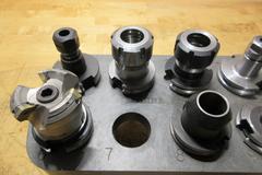 Assorted CAT40 Toolholders & Rack - ER16, ER32, Rigid Endmill Holders, Facemill