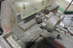 Barker Model AM,  3 Axis Milling Machine, with Pneumatic Clamping System and Pedestal Stand.