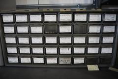 Shelving Unit with (6) Multi-Bin Cabinets with Hardware and Fasteners Contents