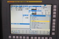Hyundai Wia LV500R CNC Vertical Turret Lathe, Fanuc 32i, 15" 3-Jaw Chuck, 12-Station Turret, LNS/Turbo Chip Conveyor