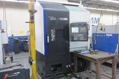 Hyundai Wia LV500R CNC Vertical Turret Lathe, Fanuc 32i, 15" 3-Jaw Chuck, 12-Station Turret, LNS/Turbo Chip Conveyor