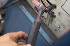 Miller Model 330A/BP AC/DC Tig Welder, with Cables, (2) Torches, Chiller, Foot Trip, Cart and Extra Rod