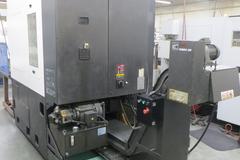 Hyundai Wia LV500R CNC Vertical Turret Lathe, Fanuc 32i, 15" 3-Jaw Chuck, 12-Station Turret, LNS/Turbo Chip Conveyor