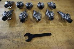 Techniks CT40 Taper Tool Holders: (10) ER16 Collet Holders, (1) Wrench