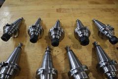 Techniks CT40 Taper Tool Holders: (10) ER16 Collet Holders, (1) Wrench