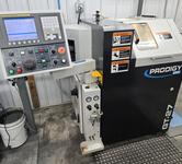 SNK Prodigy GT-27 CNC Gang Tool Lathe, Fanuc Series Oi Control,  C-Axis Programmable Spindle with Penumatic Driven Live Tools, Barfeeder, and Additional Tooling!
