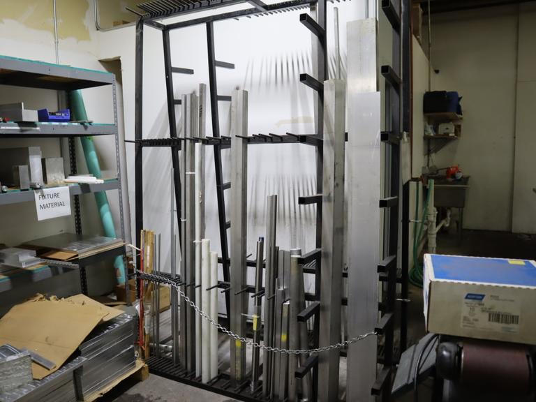 Vertical Metal Material Rack with Contents 
