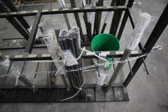 Vertical Material Storage Rack with Contents