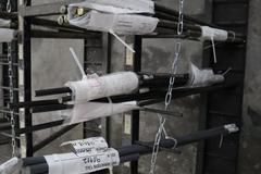 Vertical Material Storage Rack with Contents