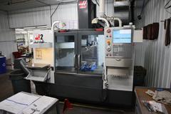 Haas VF-2 CNC Vertical Machining Center, 30"x16"x20"Travels, CT40, 20 ATC, Probing, Thru-Spindle Coolant, 4th Axis Drive - New 2014