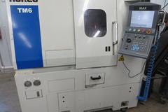 Hurco TM6 CNC Turning Center, MAX CNC Control, 6" 3-Jaw Chuck,  Collet Chucks, Tool Setter, Parts Catcher, Tailstock, Chip Conveyor