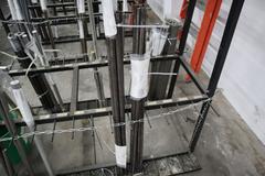Vertical Material Storage Rack with Contents