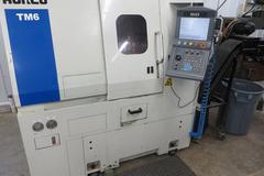 Hurco TM6 CNC Turning Center, MAX CNC Control, 6" 3-Jaw Chuck,  Collet Chucks, Tool Setter, Parts Catcher, Tailstock, Chip Conveyor