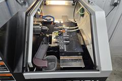 SNK Prodigy GT-27 CNC Gang Tool Lathe, Fanuc Series Oi Control,  C-Axis Programmable Spindle with Penumatic Driven Live Tools, Barfeeder, and Additional Tooling!